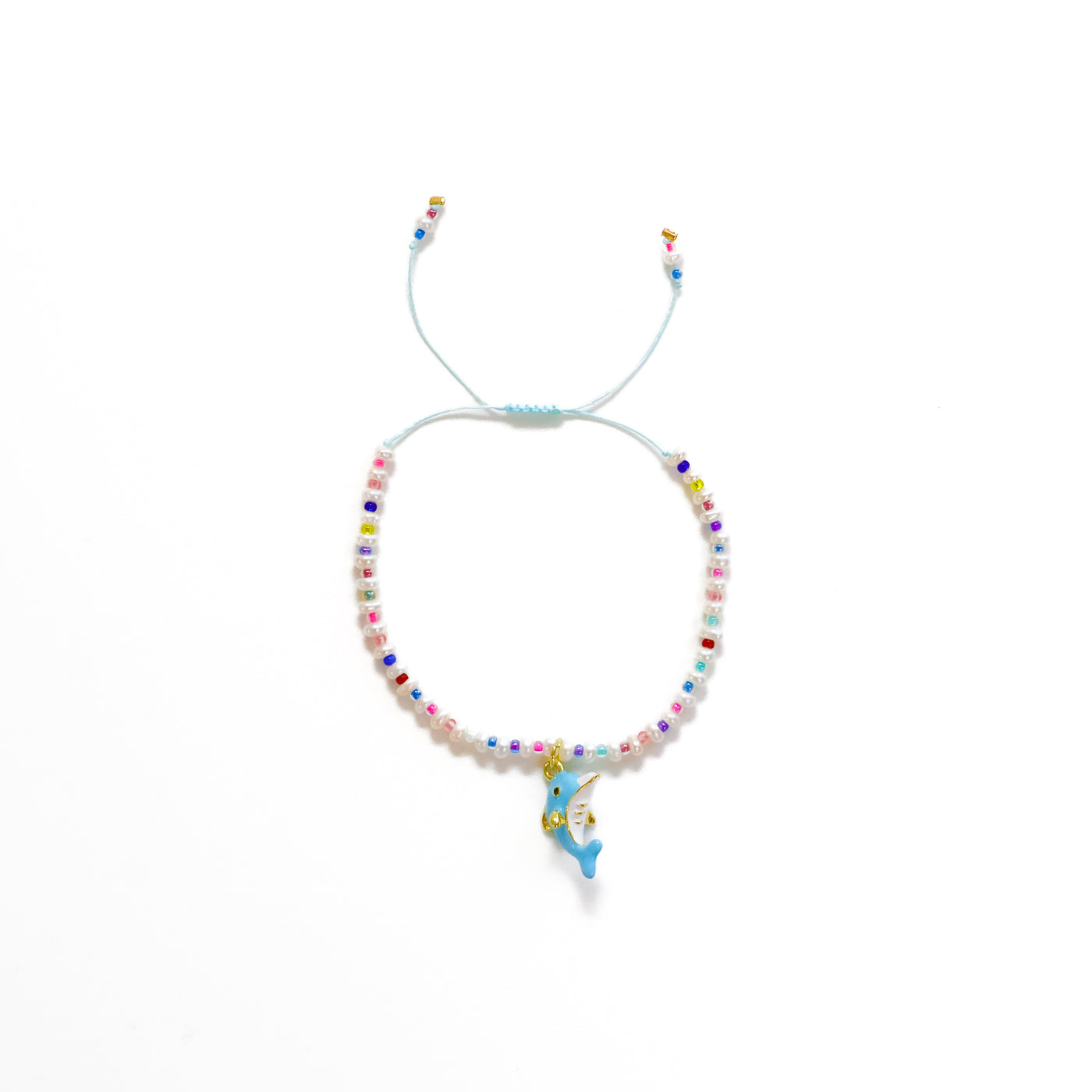 Delfín + Perlas