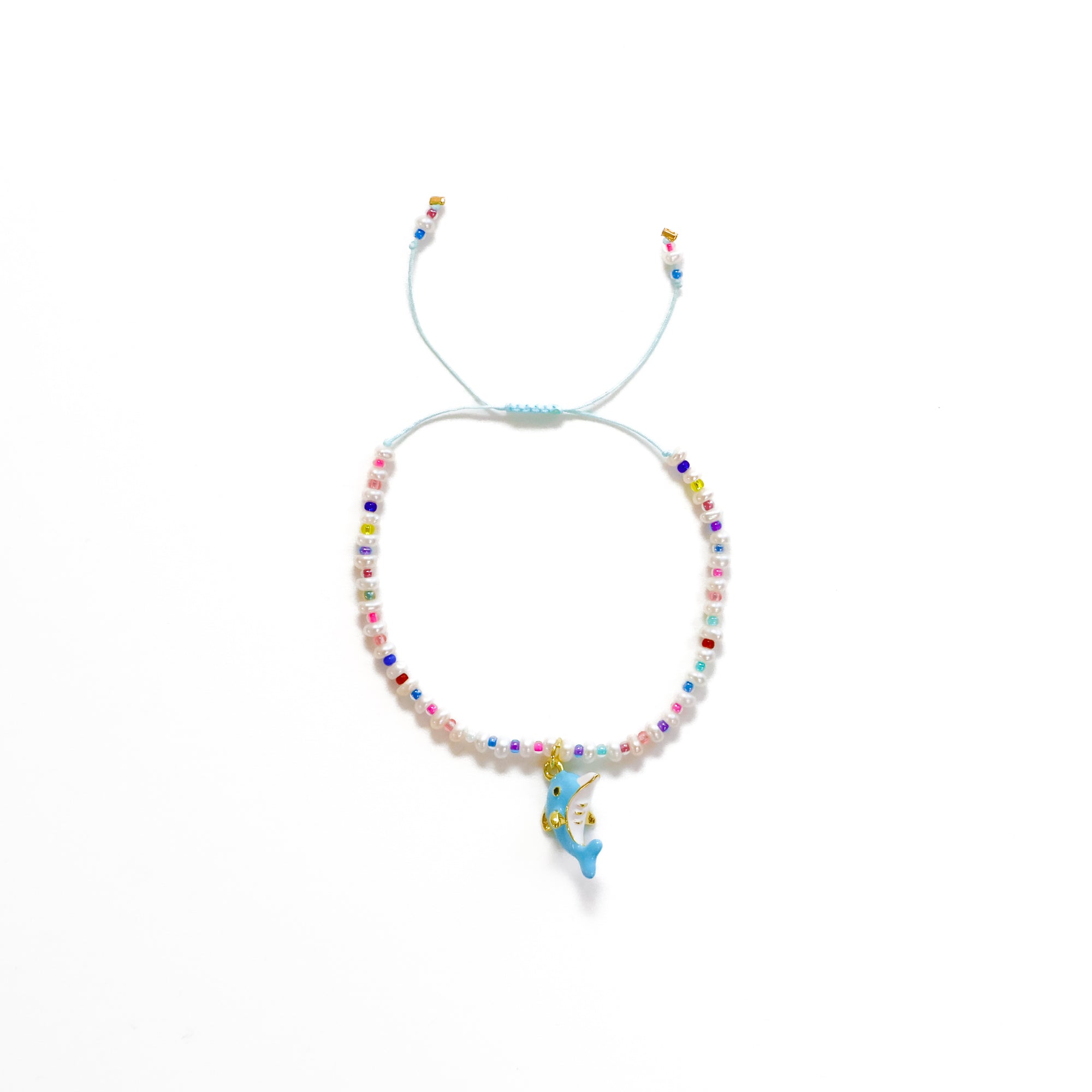 Delfín + Perlas